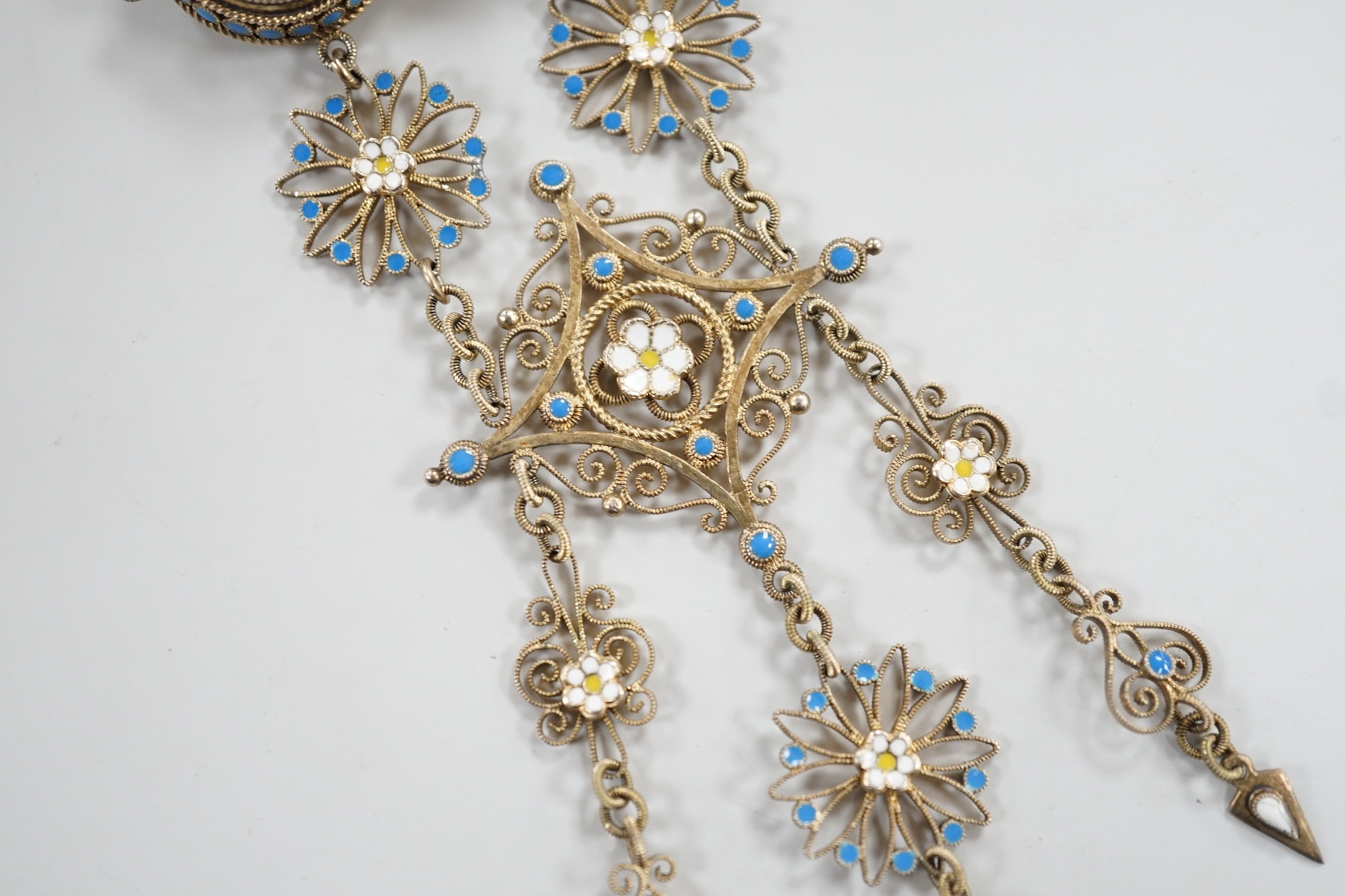 An early 20th century Scandinavian 830s gilt white metal and three colour enamel set drop brooch, 11cm, gross weight 16.3 grams.